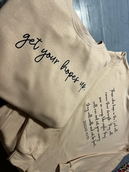 Restaurant staff uniform shirts with emblem and employee pride branding